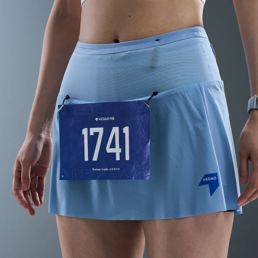 faldilla con cinturón nedao negra/azul